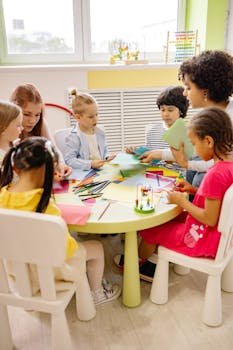 Children engaged in creative activities during an art class at a preschool, fostering learning and fun.